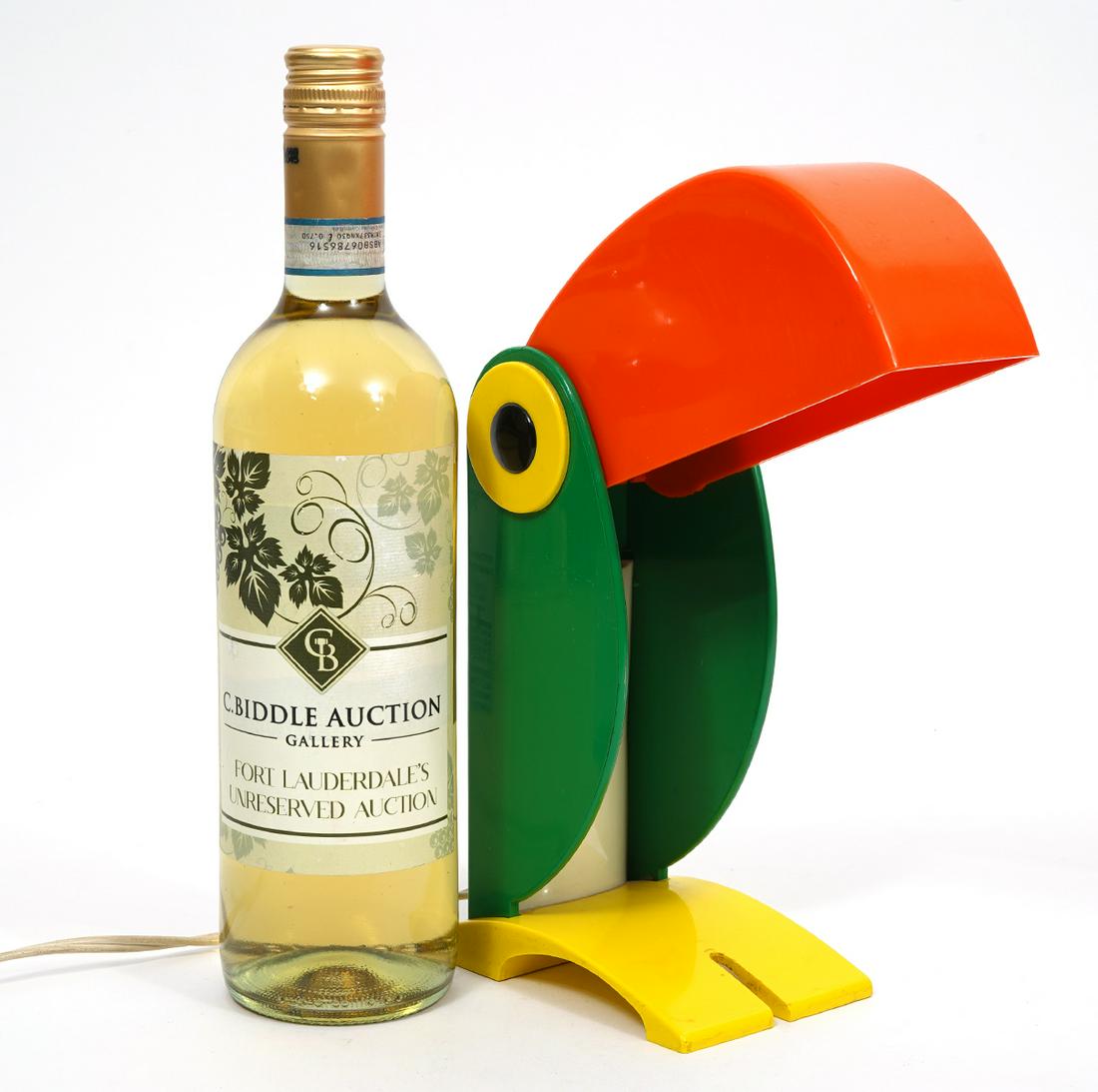 Vintage Toucan Lamp OTF Verona: Vintage colorful plastic 'Toucan' desk lamp by Old Timer Ferrari in green, orange, yellow and black. Beak can be raised and lowered for more lighting or to store when closed. measures 10.5"H when open