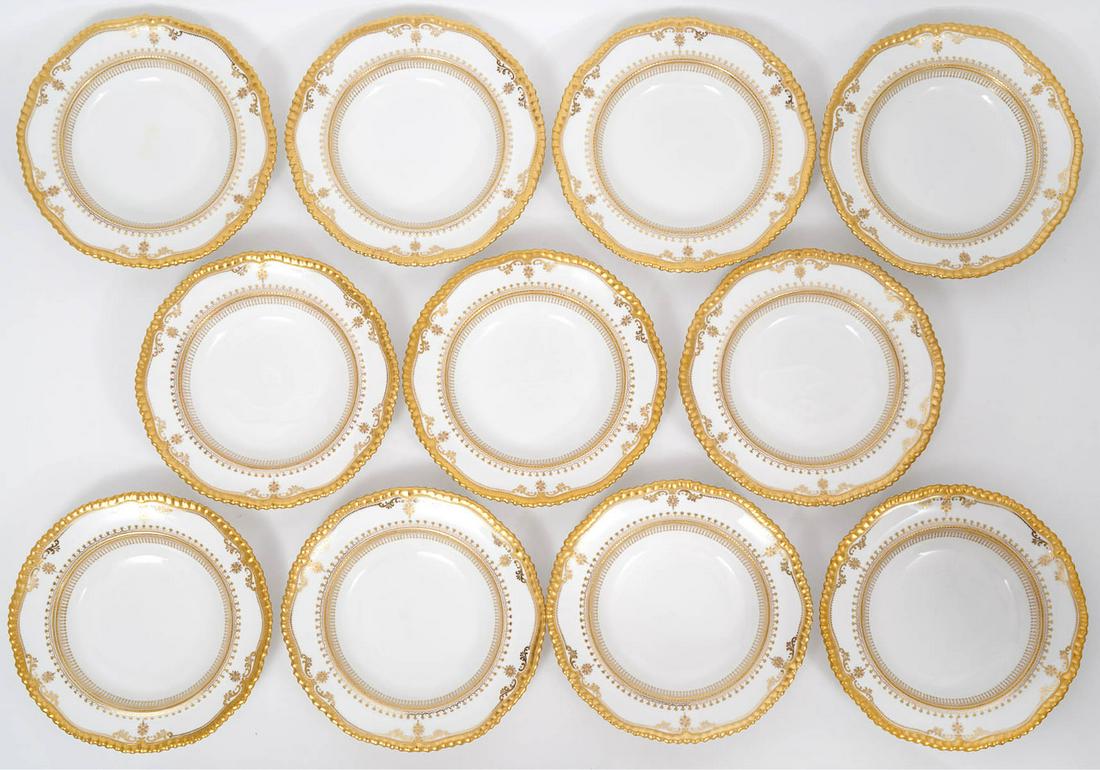 11 Spode Copeland Ivory & Gold Shallow Bowls: 11 Spode Copeland shallow bowls in ivory with heavy gold accents and scalloped rims. Marked on underside 'T. Goode & Co. Spode Copeland China England R423'. Measures 9"W x 1.25"H. Condition report: go