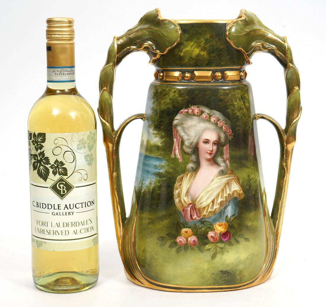 Royal Bonn German Porcelain Vase: Royal Bonn German porcelain vase with leaf formed handles, features aristocratic portrait in front of landscape scene. Hallmarked underside. Measures 12.5"H x 8.5"W. Condition report: Good condition, 