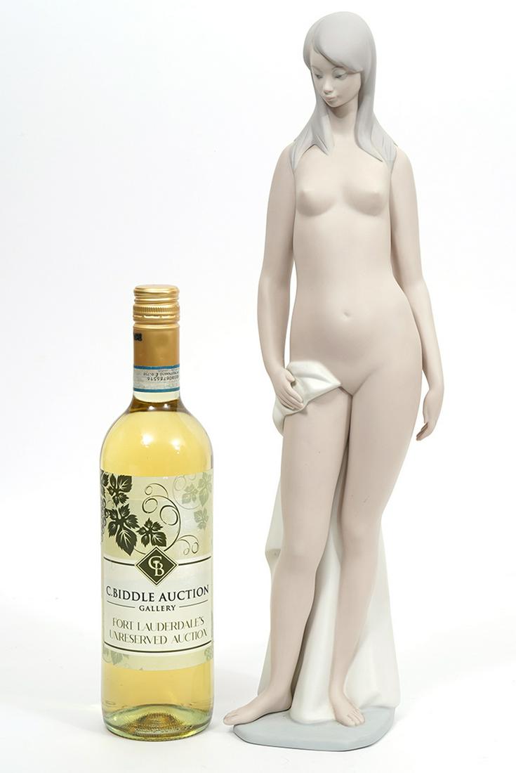 Lladro Bisque Nude Porcelain Figure: Lladro bisque porcelain figure of nude female, #4511, measures 18.5"H x 5"W, hallmarked on underside. Condition report: Good condition, no issues, please examine all photos closely. Contact C. Biddle