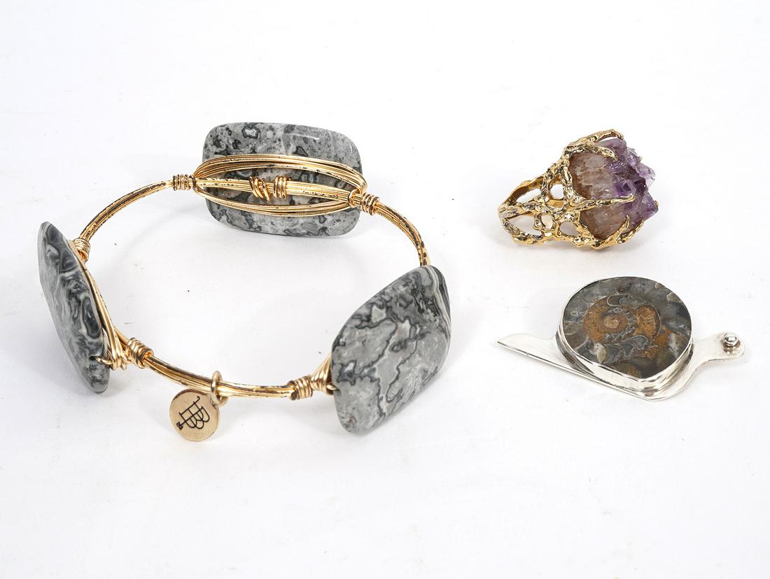 Mixed Lot of Natural Stone and Metal Jewelry 3pc: Lot includes: Sterling vermeil and amethyst geode brutalist style ring, size 5, signed Panetta. Weight 16.4g; Snail-shaped metal and ammonite fossil pin, measures 2.25"W x 1"H"; Bourbon and Bowties br