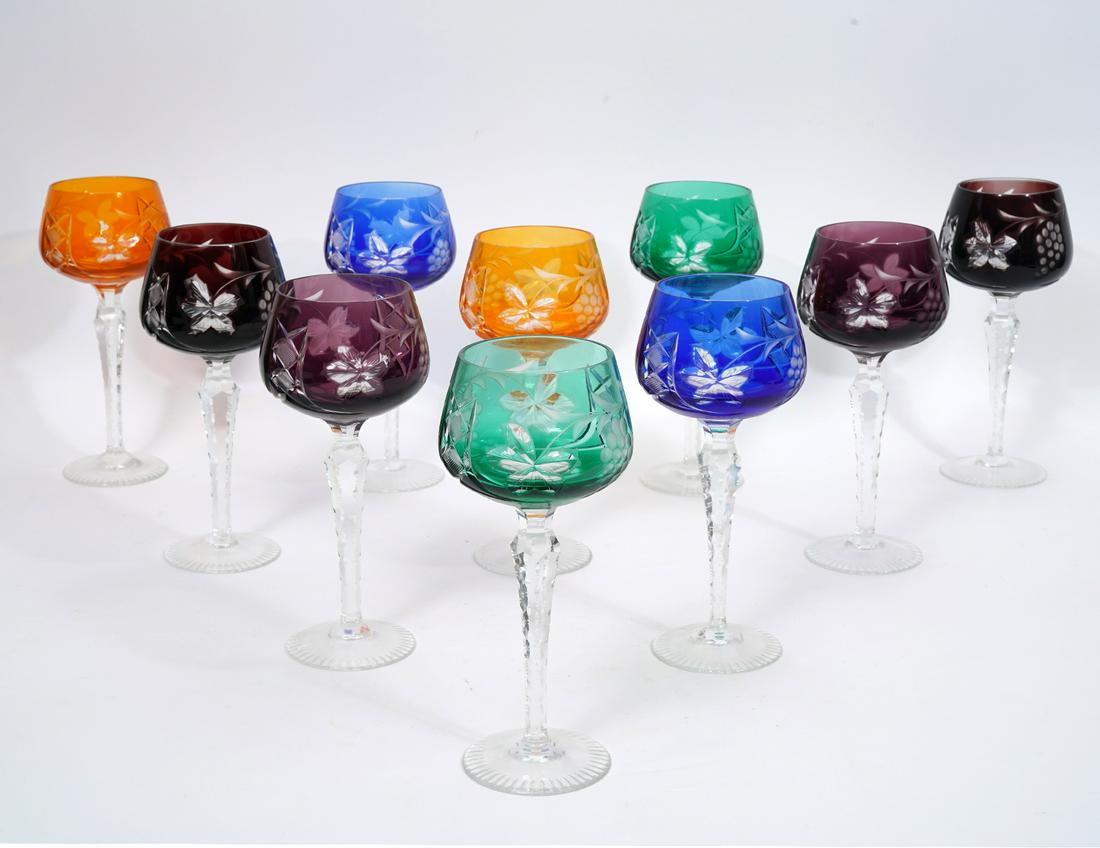 Set of 10 Bohemian Cut to Clear Goblets: Set of 10 Bohemian cut-to-clear wine goblets, with clear stems and grape themed pattern. 5 Pairs of matching colors. Measures 8"L x 3.5"W. Condition report: Good condition, no issues, please examine a