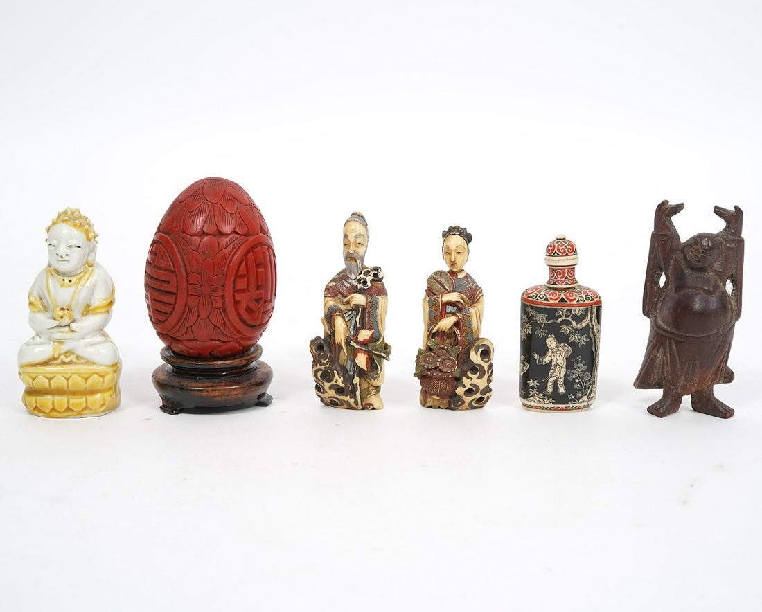 Mixed Lot of Six Chinese Miniature Figures: Two carved male and female elder figures, each measures 2.75"H; Screw top snuff bottle with figural gardenscape scene, 2.75"H; Carved wood standing buddha figure, 3"H; Glazed white and yellow buddha, 