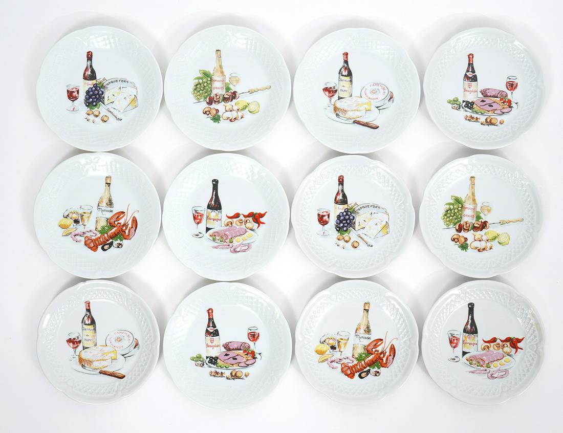 12 Phillip Deshoulieres French Limoges Plates: Phillip Deshoulieres French limoges plates, set of 12, decorated with wine and food motif. Hallmarked underside. Each measures 5.75"W. Condition report: Chip to edge of one plate, please examine all p