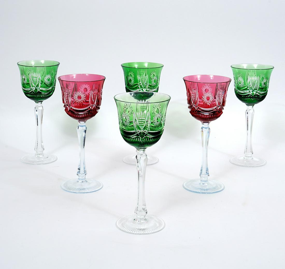 6 Bohemian Cut to Clear Wine Goblets: 6 Bohemian cut to clear wine goblets, two in red and four in green, each measures 8.25"H x 3.5"W. Condition report: Chip to edge on one green glass, please examine all photos closely. Contact C. Biddl