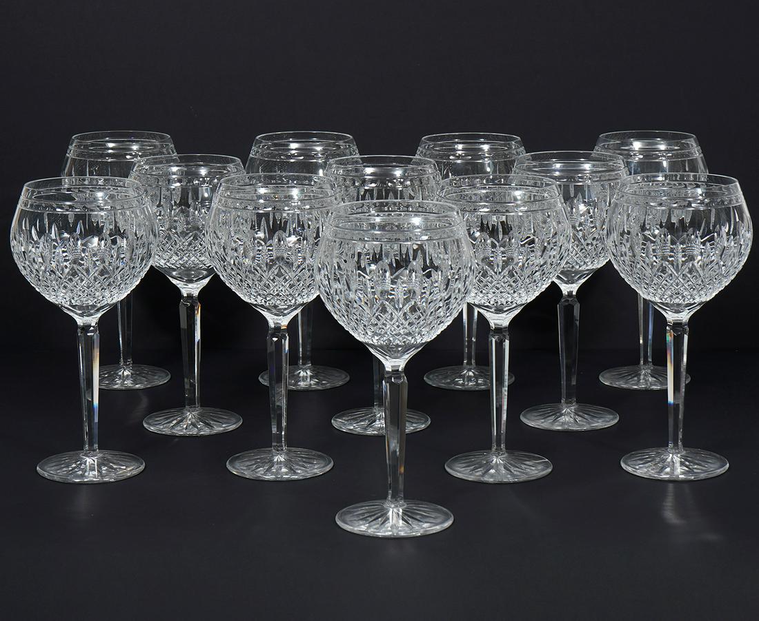 Set of 12 Waterford Clarendon Red Wine Glasses: Set of 12 Waterford crystal â€˜Clarendon' red wine glasses, features diamond cross hatch with oval cut-outs pattern. Each measures 8.25" H x 4.25"W. Condition report: Good condition, no issues, Pl