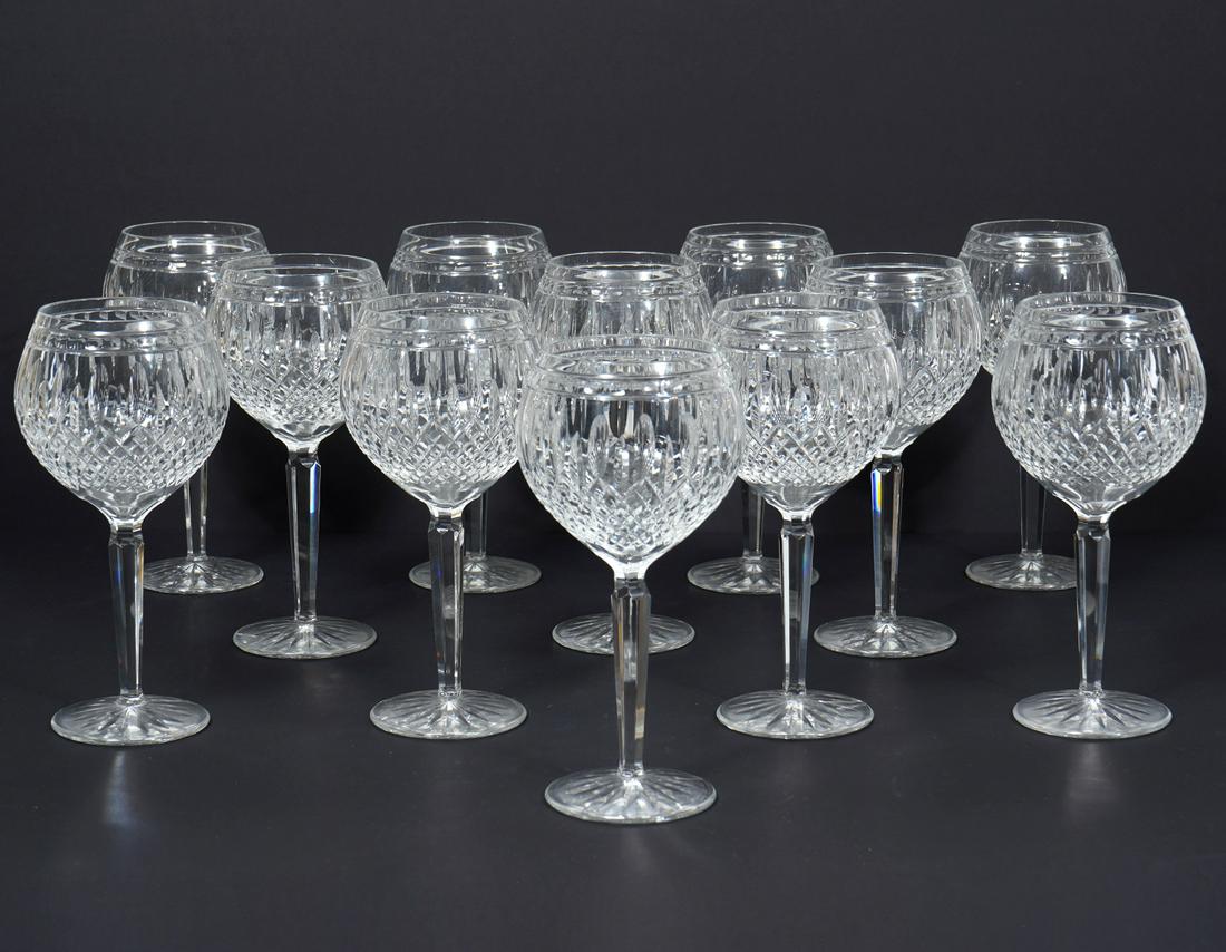 Set of 12 Waterford Clarendon White Wine Glasses: Set of 12 Waterford crystal â€˜Clarendon' white wine glasses, features diamond cross hatch with oval cut-outs pattern. Each measures 7.25" H x 3.75"W. Condition report: Good condition, no issues, 
