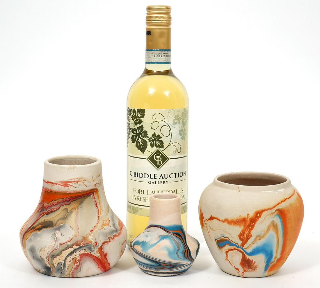 3 Pieces of Nemadji Pottery: Three pieces of contemporary artisanal Nemadji pottery from Minnesota. Native American inspired style with swirling colors on clay formations. Each production is unique. Measurements (small to large) 