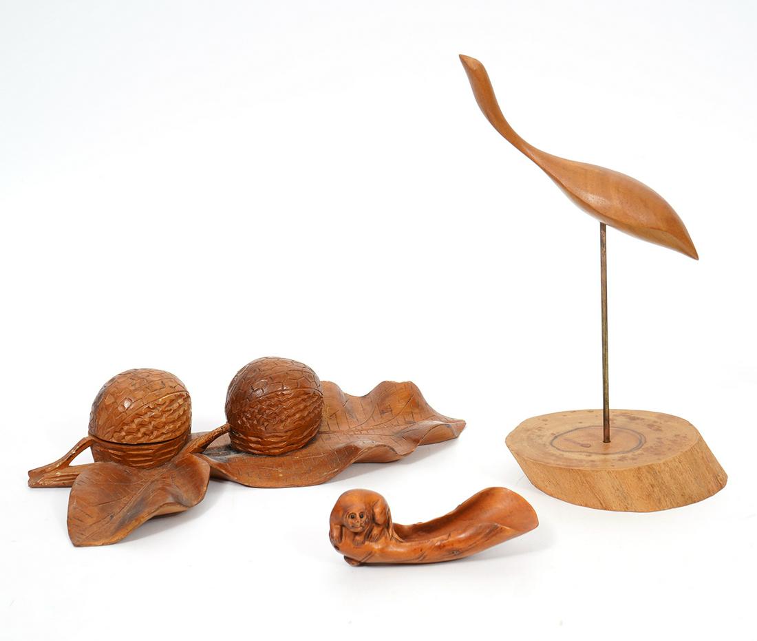 Group of Hand-Carved Wood Objects: Group includes: Modernist Milo wood bird sculpture, measures 8.75"H x 5"W; Chinese carved wood monkey measures 3.75"L x 1.5"W x 1.5"H; Double inkwell 9.5"L x 5"W x 2"H. Condition report: Some chips an