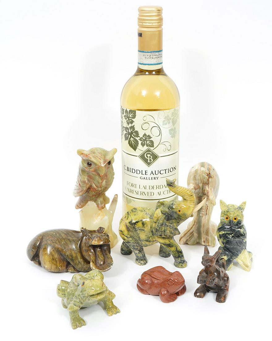 Group of 8 Carved Hardstone Animal Figures: Group of 8 carved hardstone animals figures includes, owls, frogs, elephant, hippo, kangaroo, and dolphins. Range in size 2"L x 1.5"W x 1.25"H to 2.5"W x 5"H. Condition report: Minor chips , please ex
