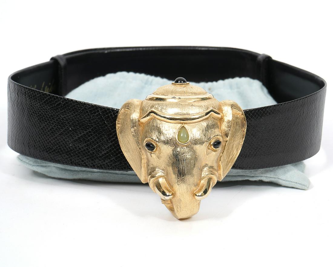 Judith Leiber Gilt Jeweled Elephant Head Belt: Judith Leiber gilt jeweled elephant head belt, reptile and cattle leather. Measures 28" from prongs to holes; 1.75" wide. Includes original dust bag. Condition report: Good condition, no issues, pleas