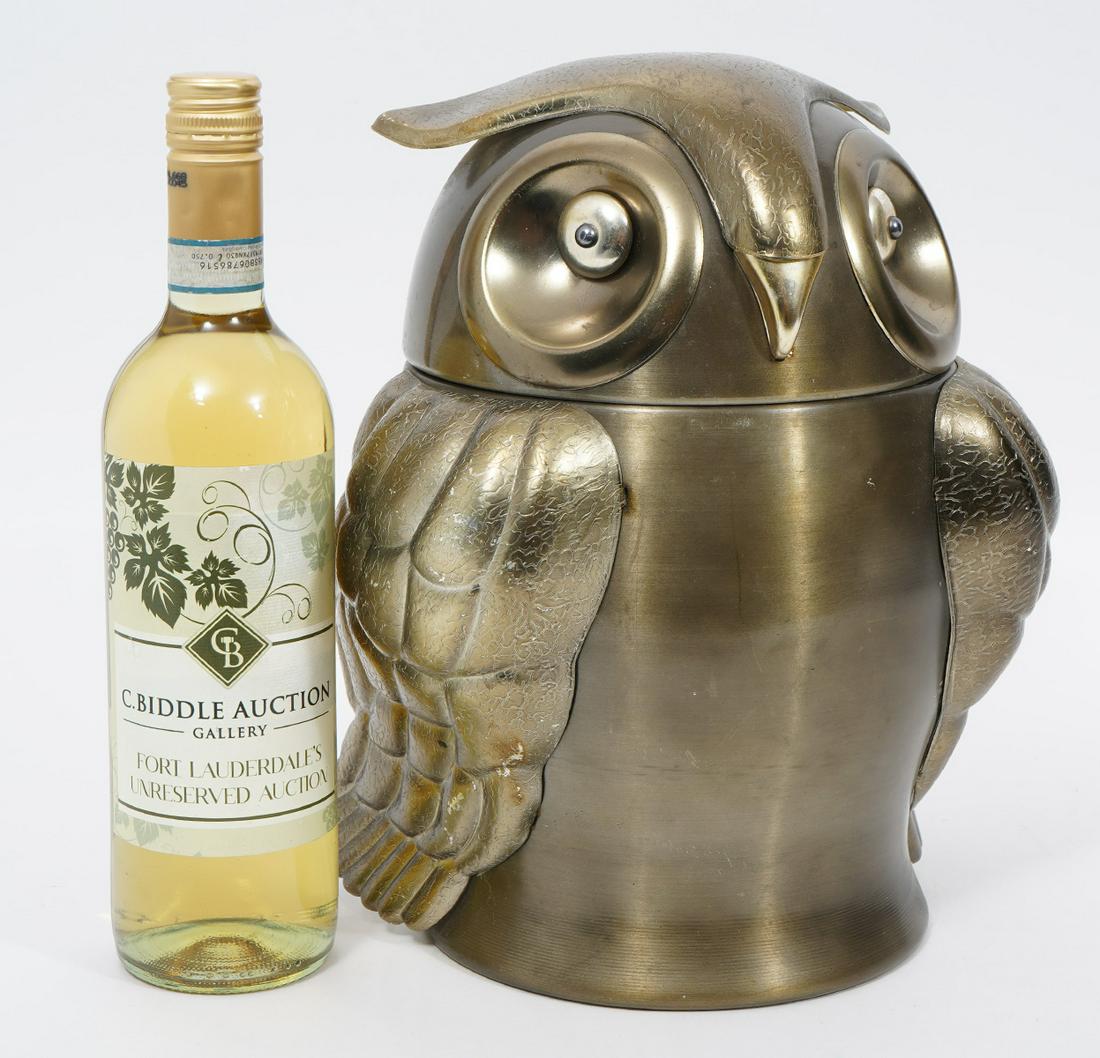 Style of Seymour Mann Aluminum Owl Ice Bucket: Aluminum owl ice bucket in the style of Italian designer Seymour Mann. Hinged head opens to lined bucket. Measures 8"L x 7.5"W x 12"H. Condition report: Some signs of use, scratches and scuffs, please
