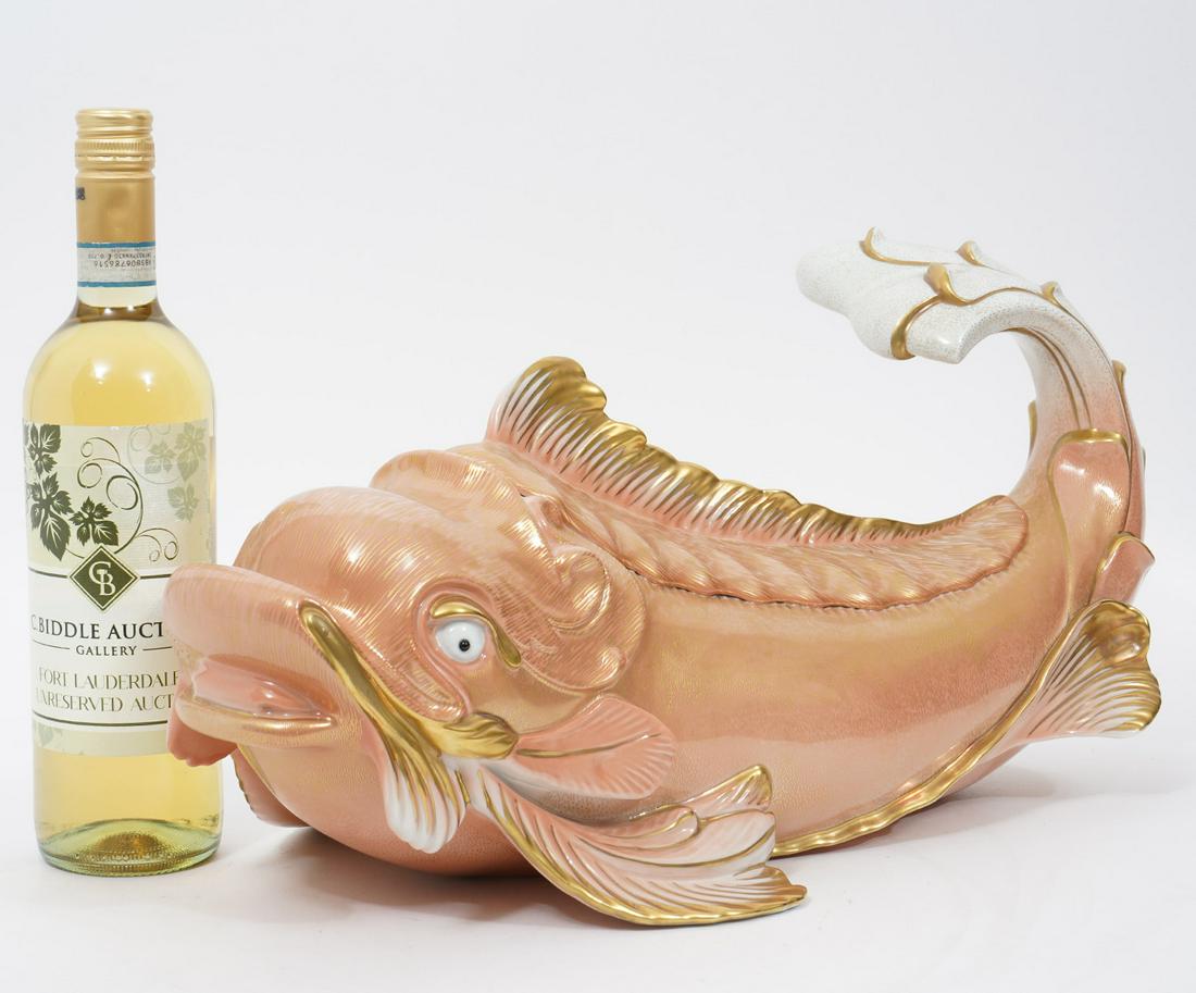 Giulia Mangani for Oggetti Porcelain Dolphin: Giulia Mangani for Oggetti Italian hand painted and gilt porcelain stylized dolphin with original tag 'Made in Italy' and signed on underside. Measures 9"H x 18.5"L x 9.5"W. Condition report: good con