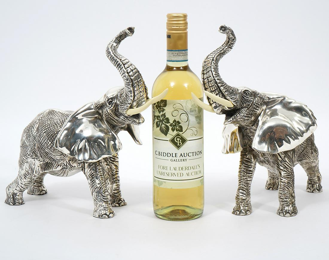 Pair of D'Argenta Sterling-Clad Elephant Figures: Pair of D'Argenta sterling silver-clad elephant figures, signed underside. Measures 12"L x 6"W x 11"H. Condition report: Good condition, no issues, please examine all photos closely. Contact C. Biddle