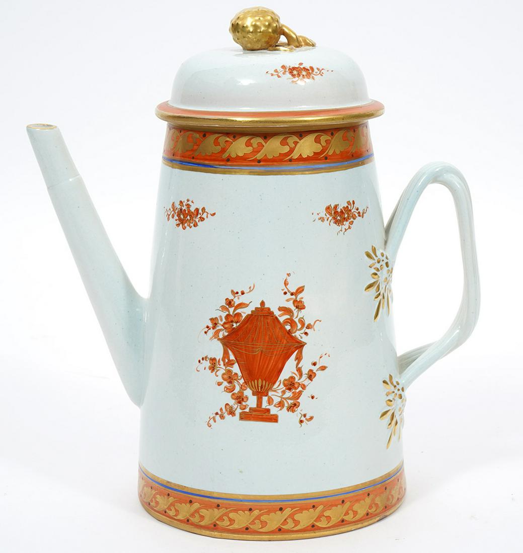 Vintage Mottahedeh Lowestoft Porcelain Teapot: Vintage Mottahedeh Lowestoft porcelain teapot in orange and gilt on white ground with gilt strawberry finial, made in Italy. Impressed marks on underside. Measures 9.5"H x 9"W (handle to spout). Condi