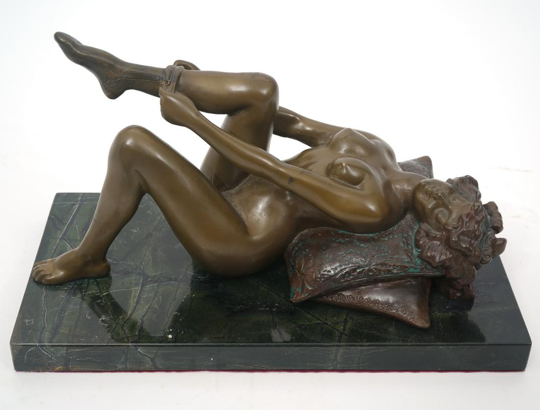 Bronze Erotica Female Nude Sculpture on Marble: Bronze erotica unsigned sculpture, features reclining female nude mounted on green marble. Measures 10.75" x 5.5"W x 7"H. Condition report: Common wear and minor oxidation, please examine all photos c
