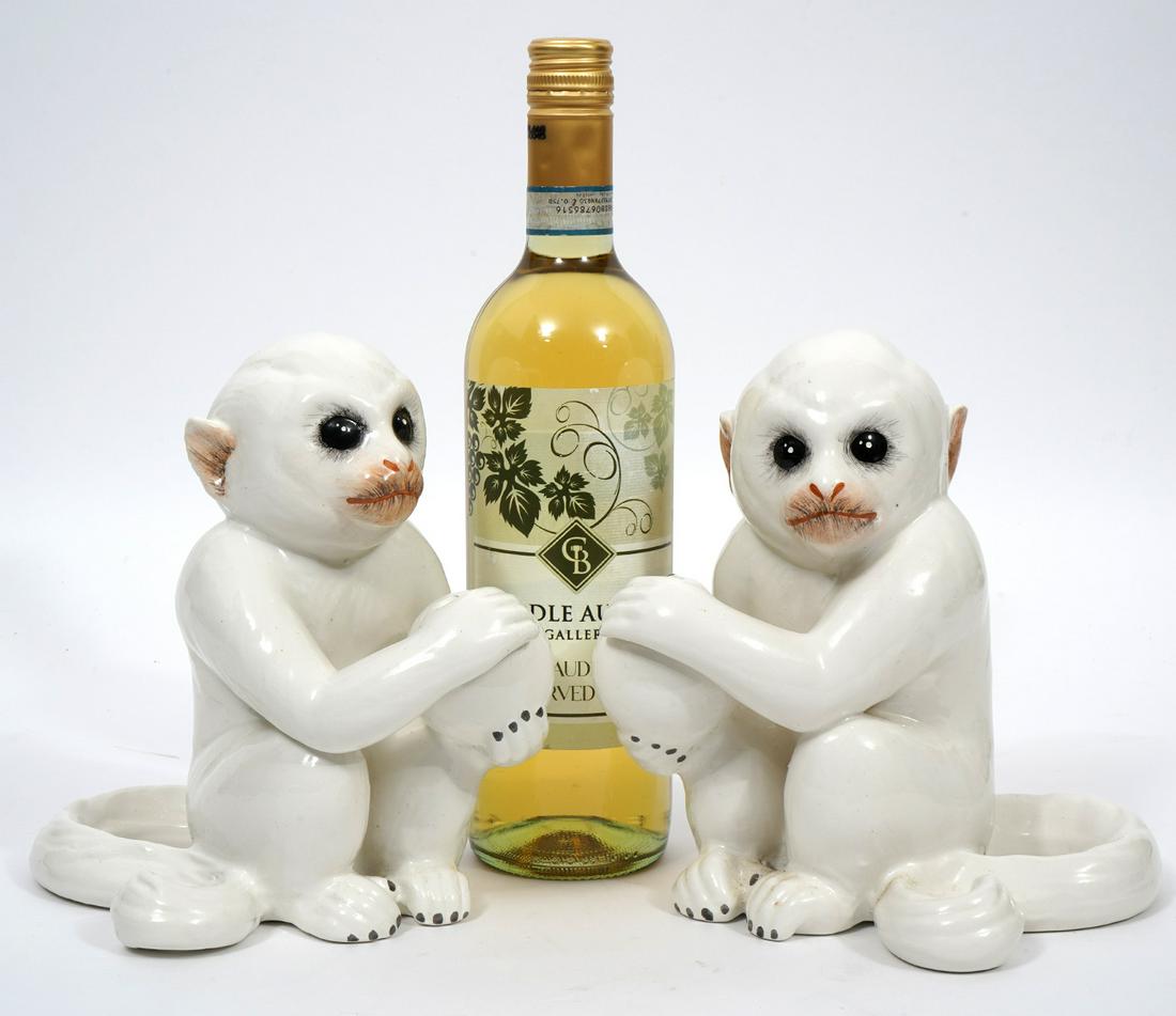 Pair of Mottahedeh Glazed Porcelain Monkeys: Pair of Mottahedeh glazed porcelain left right monkeys holding a ball, signed underside. Measures 5.5"L x 7.25"W x 7.5"H. Condition report: Good condition, no issues, please examine all photos closely