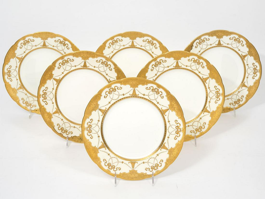 6 J.J. Freeman Toledo Pattern China Plates: 6 china dinner plates by J.J. FreemanToledo pattern, marked on underside. Ornate gilt rims with beaded swags and bows, scalloped edges. Measures 10.25"W. Condition report: good condition, please see a