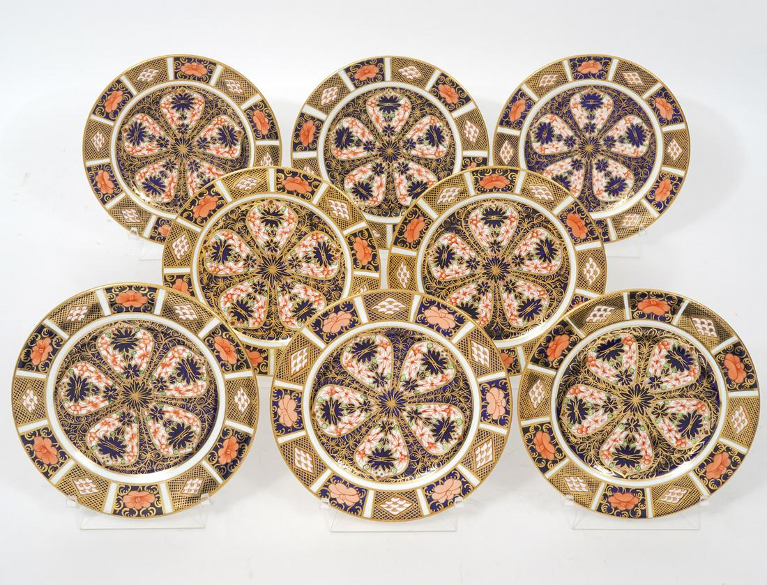 8 Royal Crown Derby Imari Bread & Butter Plates: 8 Royal Crown Derby Imari 22K gold rimmed bone china bread and butter plates, marked underside. Measures 6.25"W. Condition report: good condition, please see all photos.Contact C. Biddle Auction Galle