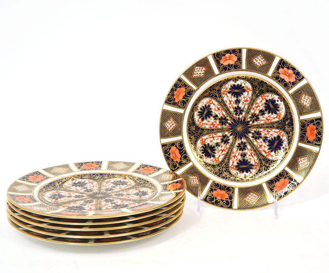 6 Royal Crown Derby Imari Salad Plates: 6 Royal Crown Derby Imari 22K gold rimmed bone china salad plates, marked underside. Measures 8"W. Condition report: good condition, please see all photos.Contact C. Biddle Auction Gallery for more de