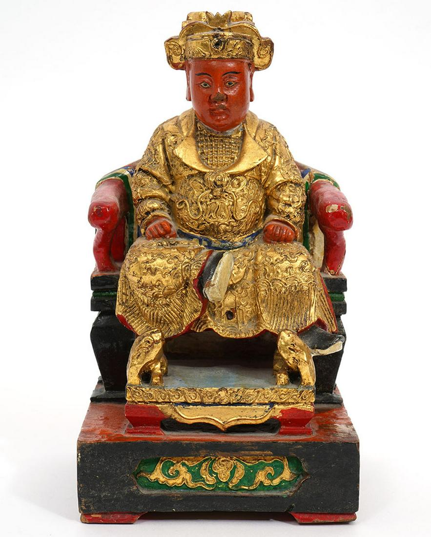 Chinese Lacquered Carved Wood Guang Ze Zun Wang: Chinese lacquered carved wood figure of Guang Ze Zun Wang, seated in chair with one leg up. Measures 4.5"L x 4"W x 8.25"H. Condition report: Various chips, cracks and other common wear for age, please