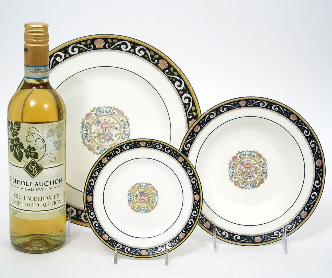 34 Pcs. Wedgewood Runnymede Blue China: 34 pieces Wedgewood Runnymede blue bone china includes 11 dinner plates (10.75"W); 11 bread &. butter plates (6"W); 12 bowls (8"W). Condition report: 2 dinner plates have hairline cracks, please see p