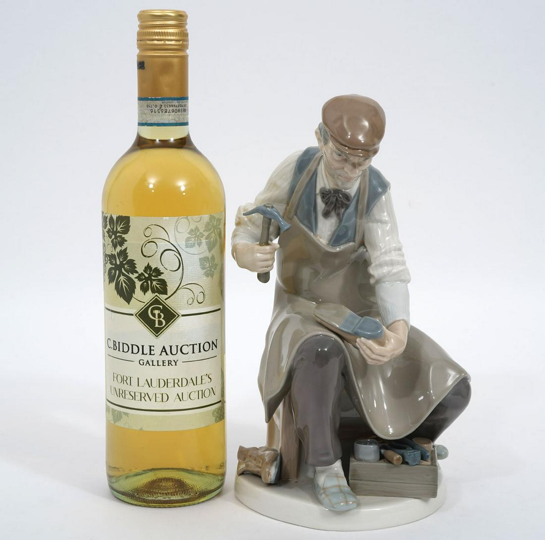 Lladro "The Cobbler" Porcelain Figure: Llladro "The Cobbler" porcelain figure, #4853, stamped underside. Features a seated man, hammer in hand, repairing a shoe. Measures 5"L x 5"W x 9.75"H. Condition report: Good condition, no issues, ple