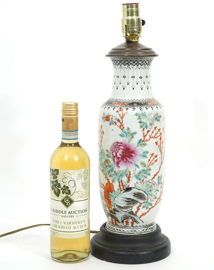 Chinese Porcelain Vase Converted to Lamp: Chinese porcelain vase converted to lamp. Features Painted motif of flowers and leaves with repeating black pattern on top. Circular red character mark. Measures Vase 12.75"H, overall 22". Condition r