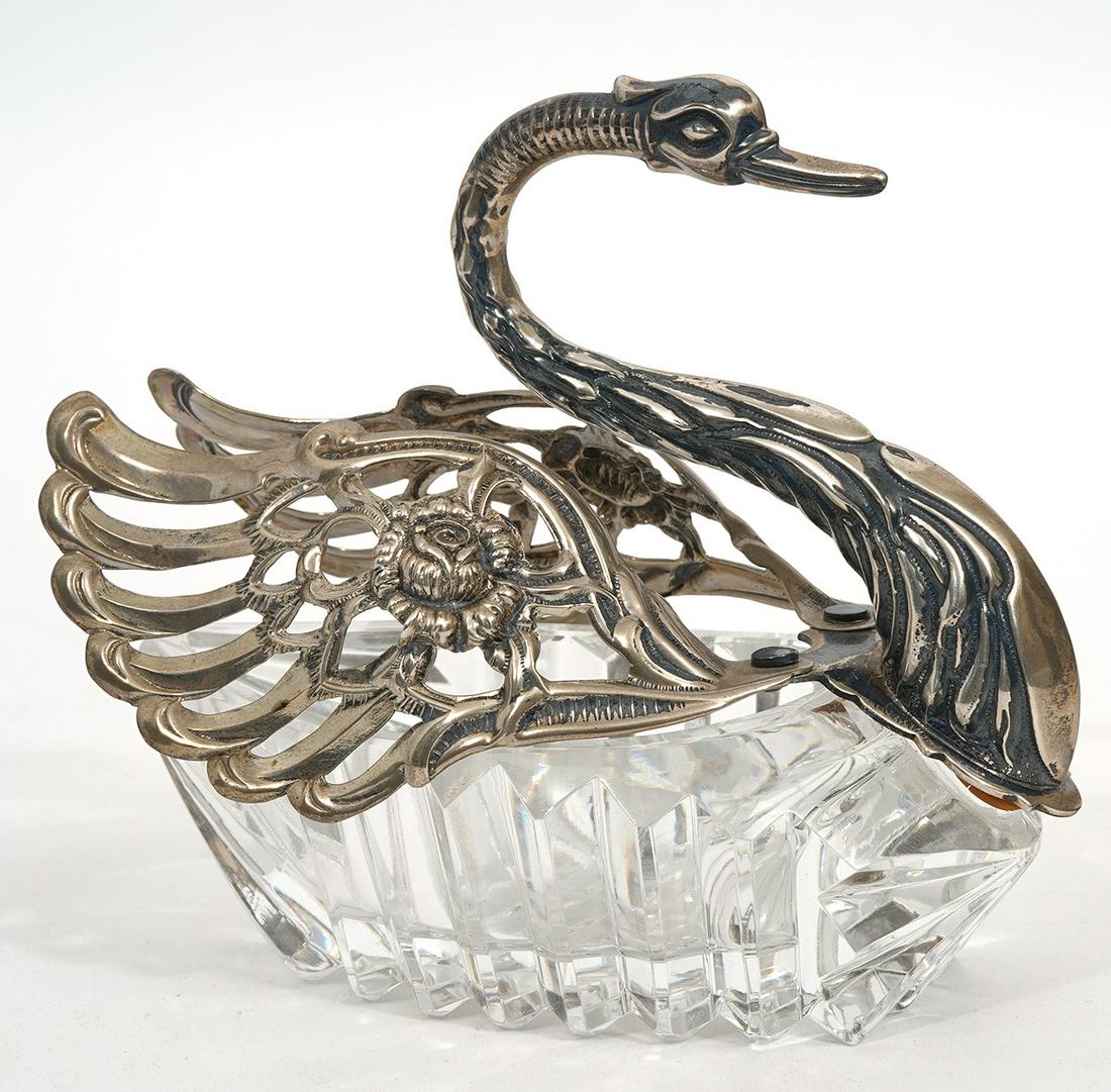 Sterling Silver and Crystal Swan Salt Cellar: Sterling silver and crystal swan salt cellar with movable wings. Measures 4.25"L x 2.5"W x 4"H. Condition report: Signs of repair at base of neck, please examine all photos closely. Contact C. Biddle