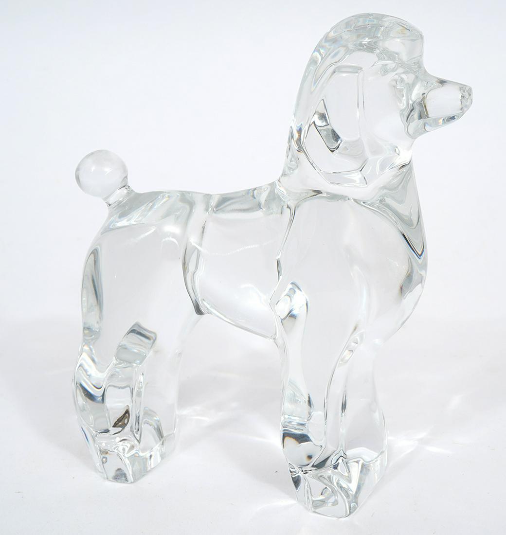 Baccarat Crystal Poodle Figure: Baccarat clear crystal poodle figure, acid-etched mark underside. Measures 4.5"L x 1.75"W x 5.25"H. Condition report: Good condition, no issues, please examine all photos closely. Contact C. Biddle Au