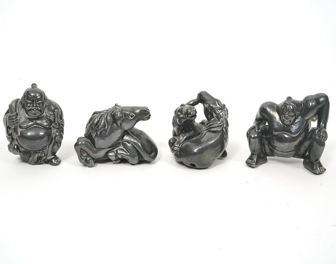 Group of Four Sterling Silver Netsukes: Group of four Chinese sterling silver netsukes, two sumos and two horses. Range in size from 1" to 1.5". Total weight - 106.8g. Condition report: Good condition, no issues, please examine all photos c