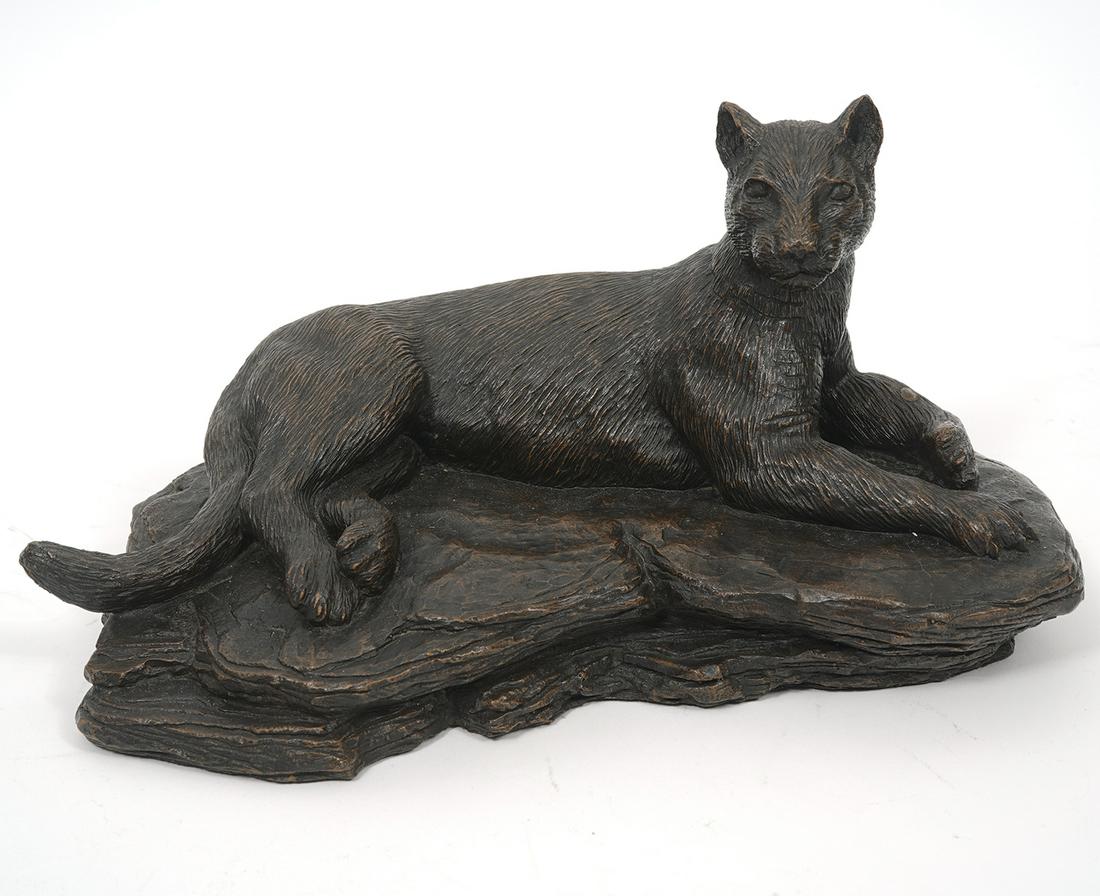 Larry Bartosh Mountain Lion Bronze Sculpture: Larry Bartosh signed bronze of a reclining mountain lion or puma. Measures 10.5"L x 7.5"W x 5.5"H. Condition report: Good condition, no issues, please examine all photos closely. Contact C. Biddle Auc
