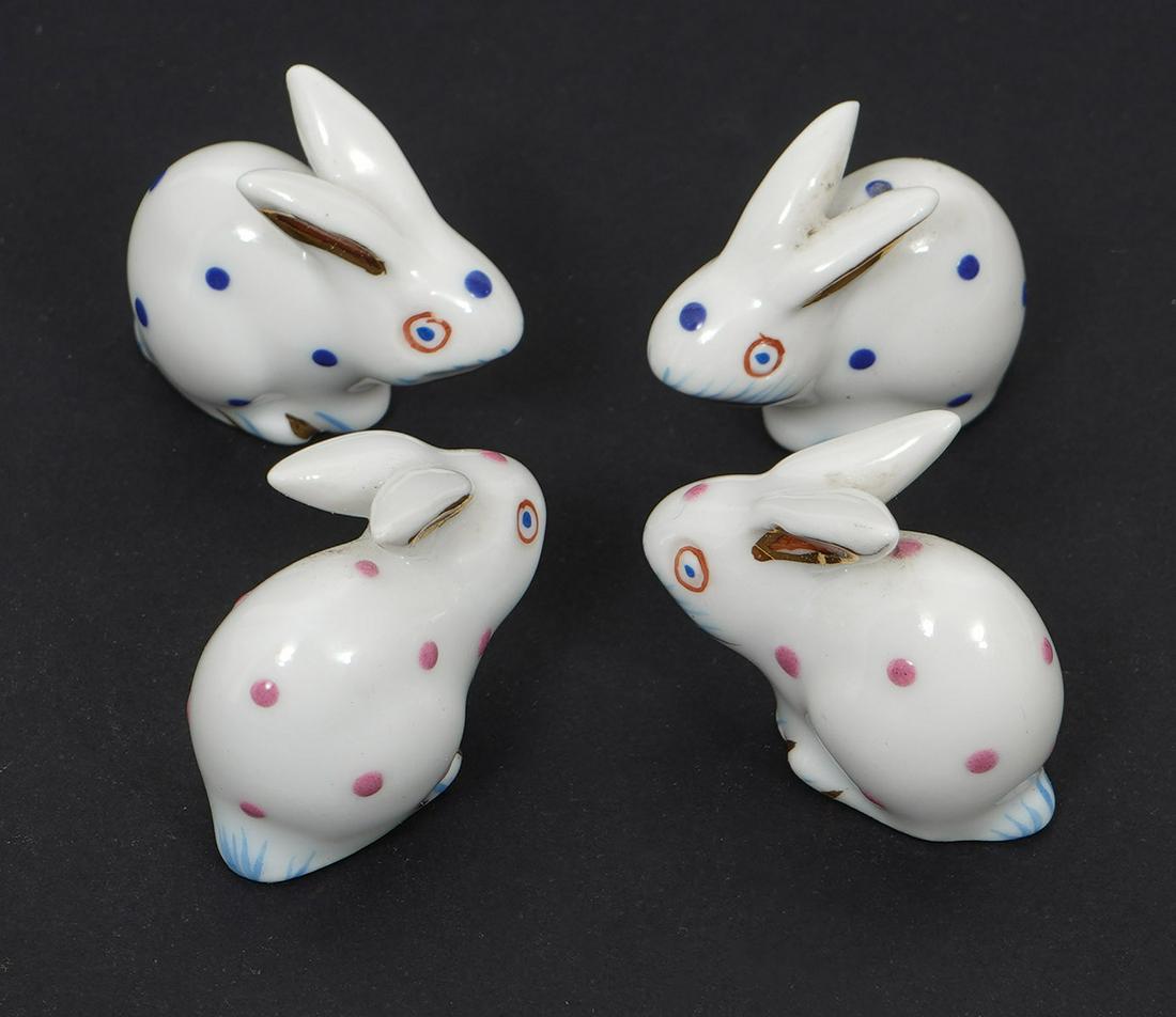 Four Herend Miniature Porcelain Bunnies: Four Herend miniature porcelain bunnies, glazed white with spots. Hallmarked underside. Each measures approximately 1". Condition report: Good condition, no issues, please examine all photos closely. 