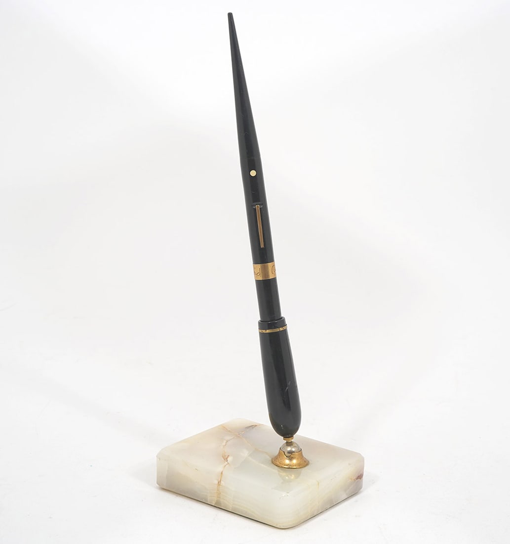 Schaefer Fountain Pen With Onyx Base Holder: Schaefer fountain pen with onyx base holder. Total measurements - 3.5"L x 3"W x 10"H. Condition report: Good condition, no issues, please examine all photos closely. Contact C. Biddle Auction Gallery 