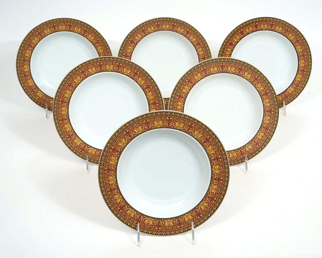 Six Versace Rosenthal Medusa Soup Bowls: Six Versace Rosenthal Medusa Red soup bowls, 8.75". Features the iconic style of the Italian designer. Condition report: Good condition, please examine all photos closely. Contact C. Biddle Auction Ga