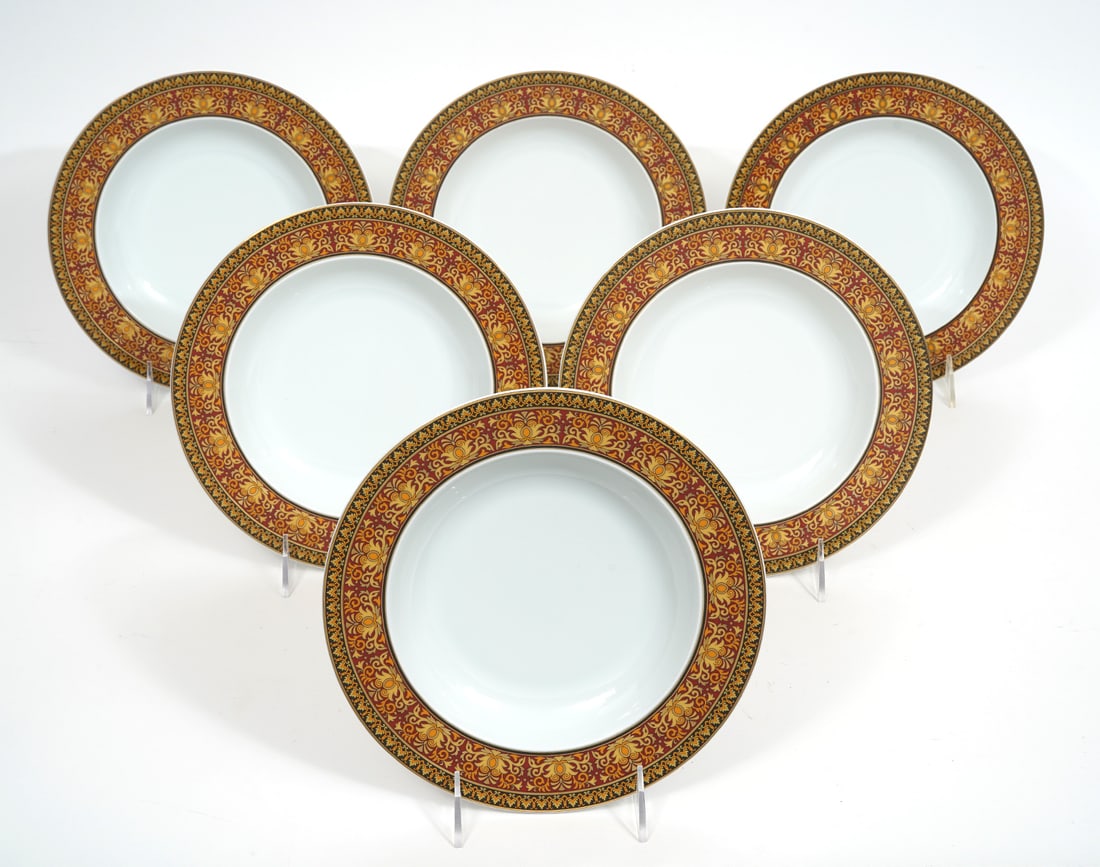 Six Versace Rosenthal Medusa Soup Bowls: Six Versace Rosenthal Medusa Red soup bowls, 8.75". Features the iconic style of the Italian designer. Condition report: Good condition, please examine all photos closely. Contact C. Biddle Auction Ga