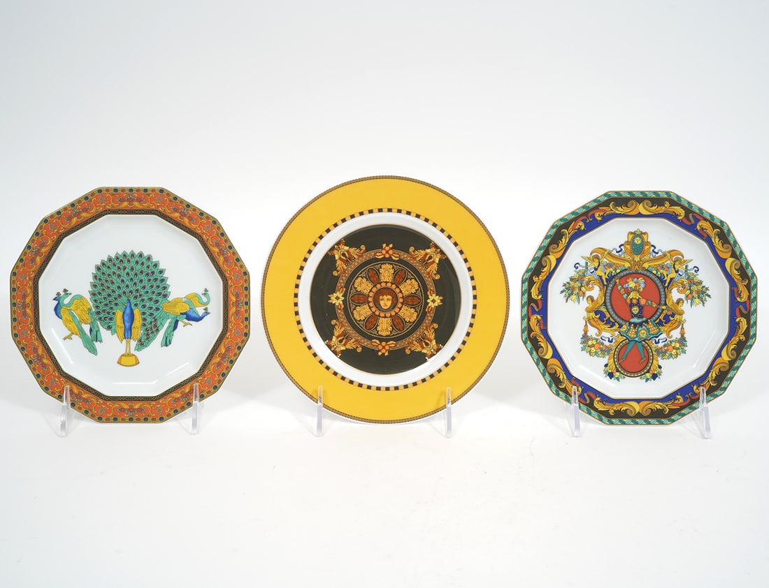 3 Versace for Rosenthal Porcelain Dessert Plates: Versace for Rosenthal porcelain dessert plates includes Barocco (7") with original box. Le Roi Soleil (6.75"). Le Voyage de Marco Polo (7"). Condition report: Good condition, please examine all photos