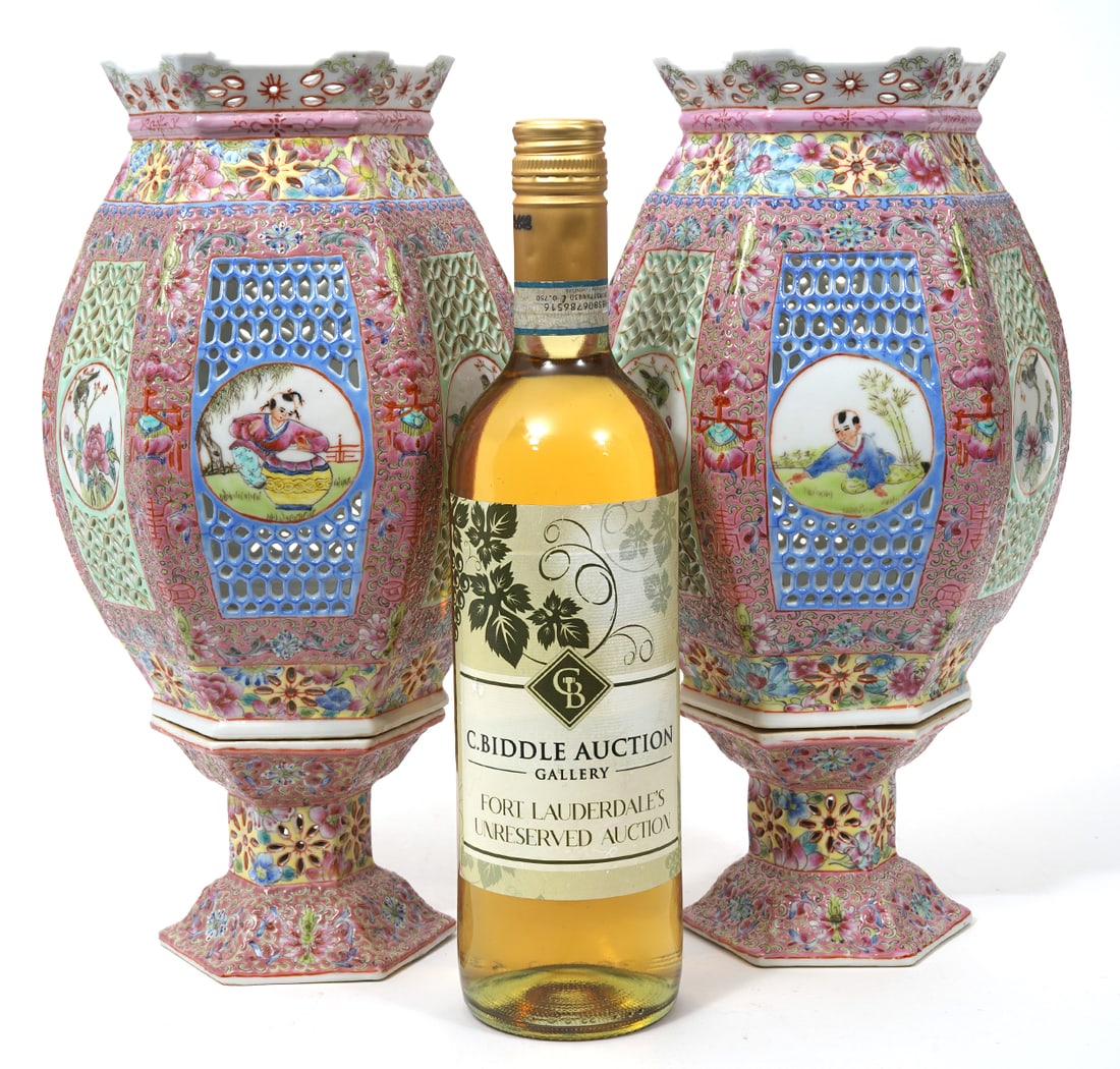 Pair of Chinese Famille Rose Porcelain Lanterns: Pair of Chinese famille rose porcelain lanterns, features hexagonal-shape pierced sections with medallions of aviary and figural scenes. Measures 12.5"H x 7"W. Condition report: Good condition, no iss