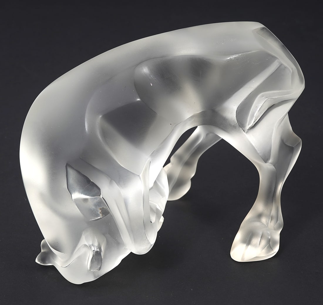 Lalique 'Auroch Taureau' Crystal Bull Figure: Lalique 'Auroch Taureau' frosted crystal bull figure. Signed underside and labeled on side. Measures 5"L x 3.5"W x 4.5"H. Condition report: Good condition, please examine all photos closely. Contact C