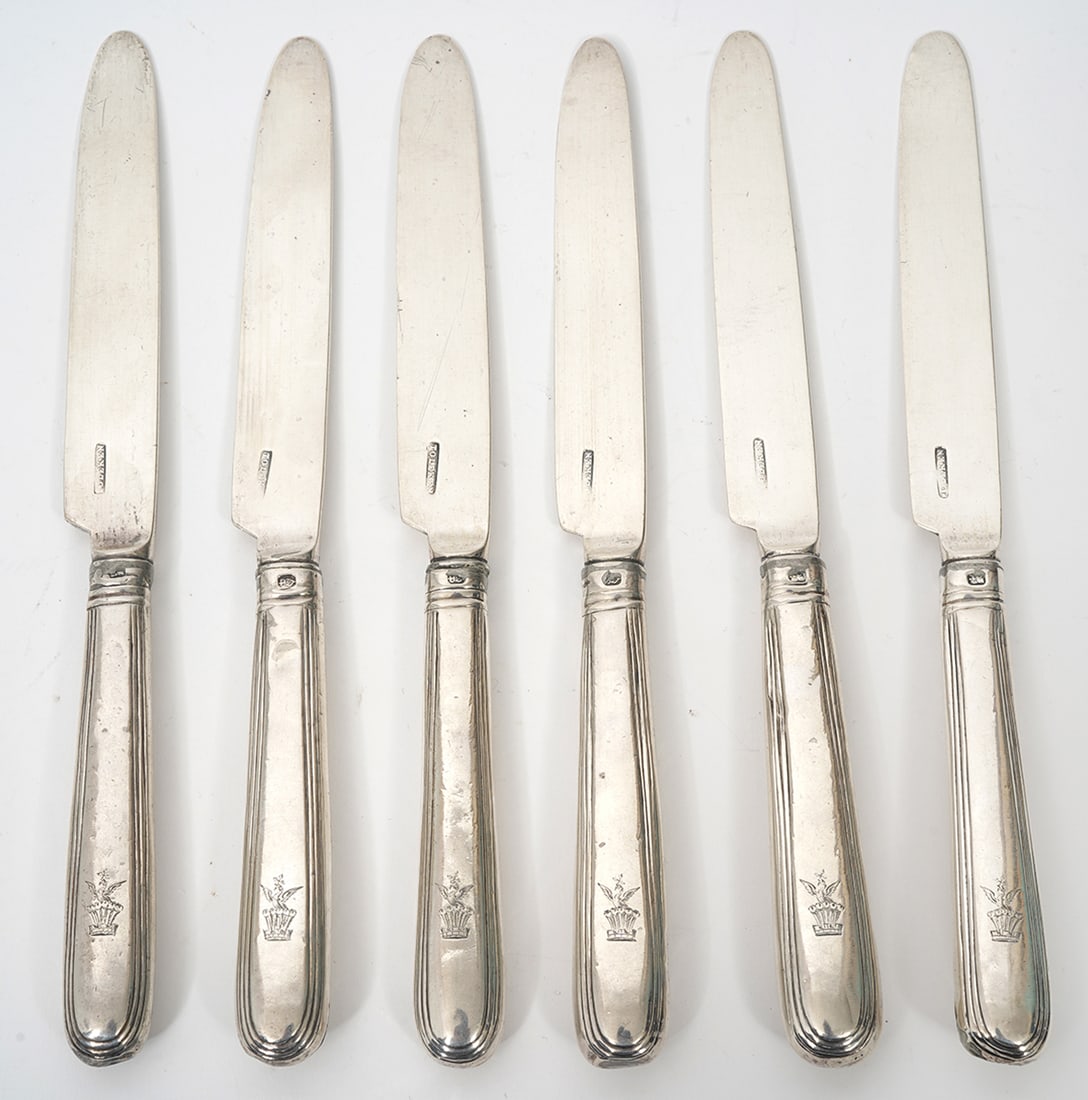 Set of 6 John Toleken Irish Silver Dinner Knives: Set of 6 Irish Silver dinner knives by John Toleken. Engraved with bird and crown emblem. Measures 9" long. Hallmarked on blade. Condition report: Good condition, common wear for age and use, please e