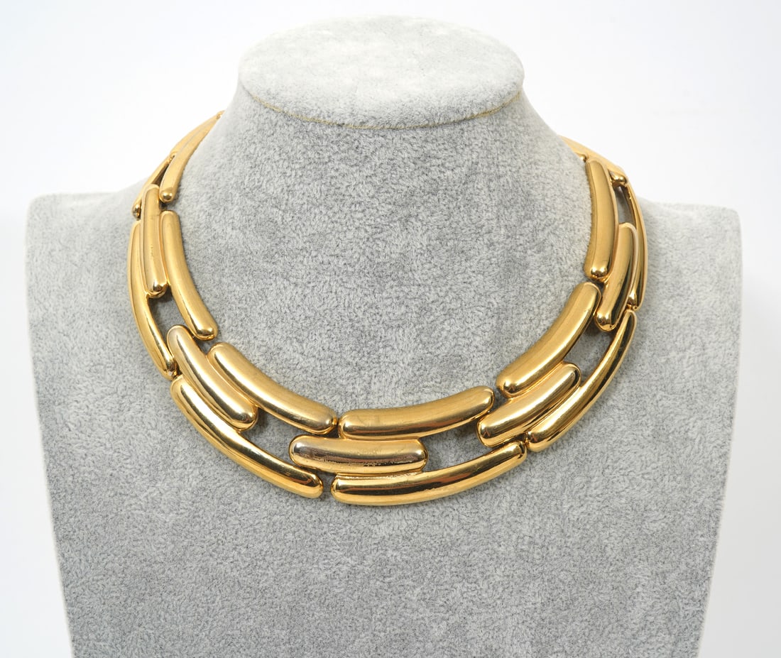 Givenchy Gold-Tone Link Necklace: Givenchy gold-tone link necklace with an approximate circumference of 13". Hallmarked underside. Condition report: Good condition, please examine all photos closely. Contact C. Biddle Auction Gallery