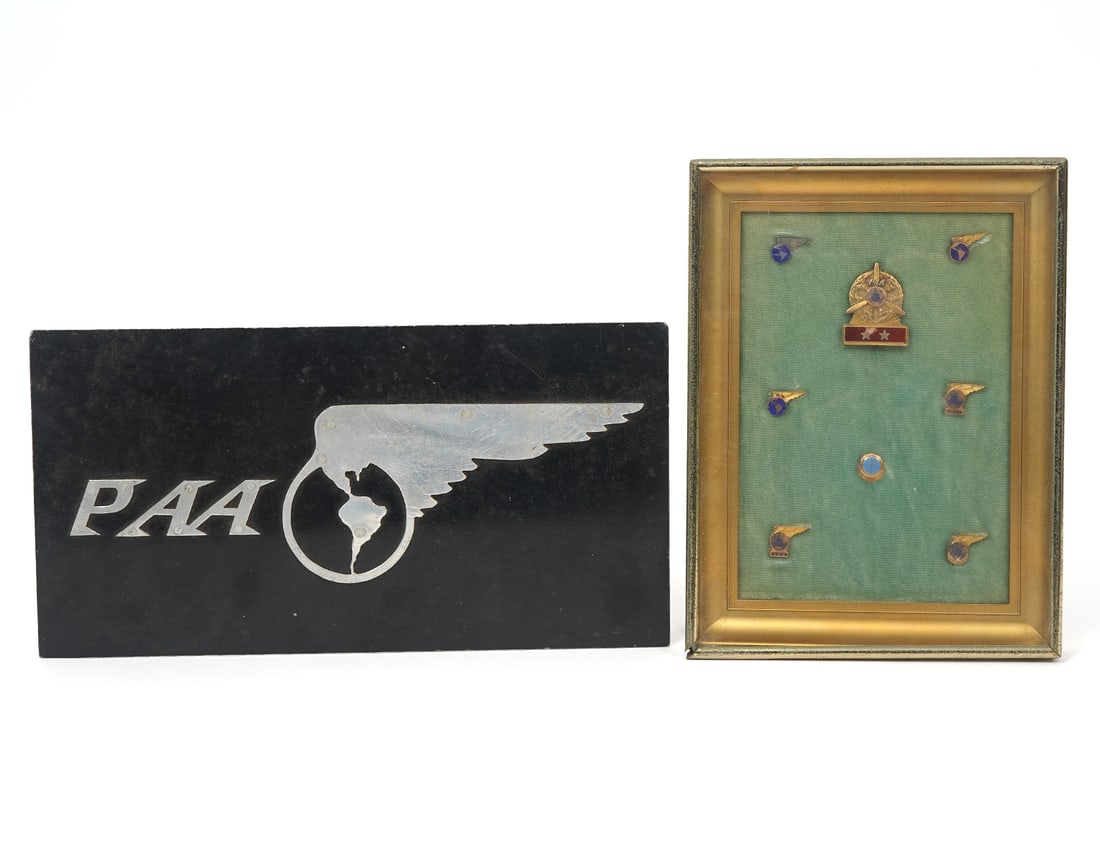 Circa 1940s Pan Am Airlines Service Pins in Frame: Circa 1940s Group of 8 Pan Am Airlines service pins in frame, and Pan Am plate (10.5"H x 5.5"W). Some pins might be 10K gold filled. Propeller pin maybe for mechanic or engineer. Condition report: Mis