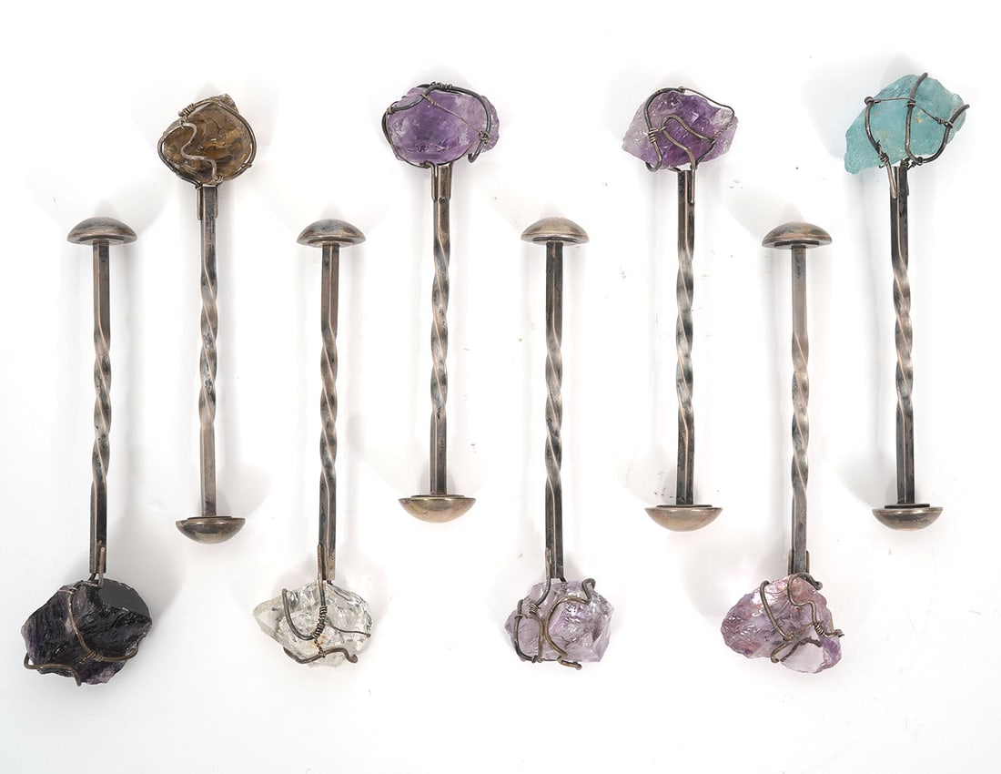 8 Natural Crystal & Twisted Metal Knife Rests: 8 natural crystal & twisted metal knife rests, each measures 5" long. Comes in fabric sleeve. Hallmarked with "D". Condition report: Good condition, please examine all photos closely. Contact C. Biddl