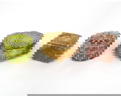 Three Jewelry / Trinket Boxes: Mixed group of three jewelry or trinket boxes includes a French round gilt green trinket box (2"H x 3"W); Edna Hibel pink marble stone box (2.75"H x 2"W x 2"H); Two hearts gilt metal with pink fabric