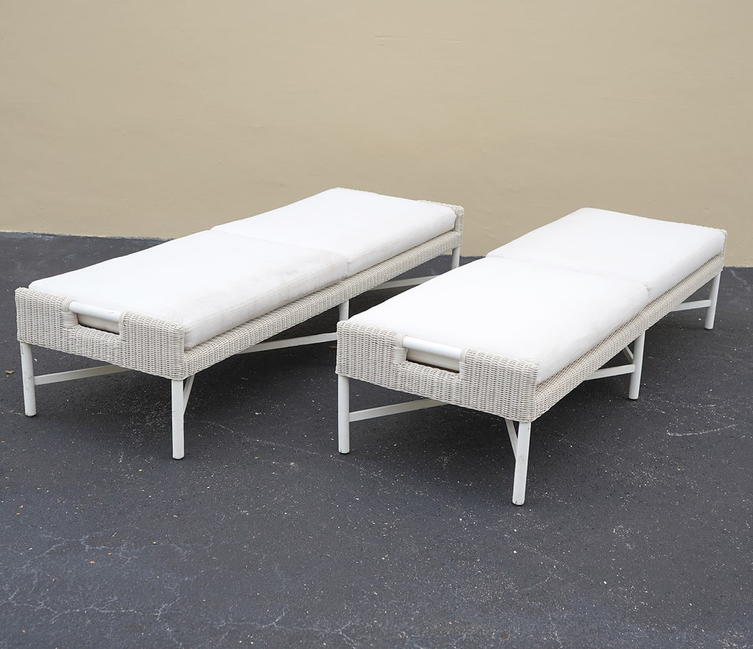 Thomas Pheasant for McGuire Outdoor 2 Chaises: Thomas Pheasant for Baker/McGuire, two outdoor chaise lounges (30"W x 80"L x 16"H) and round glass top table (28"H x 60"W). Composed of metal and resin. Condition report: Wear commensurate with use an