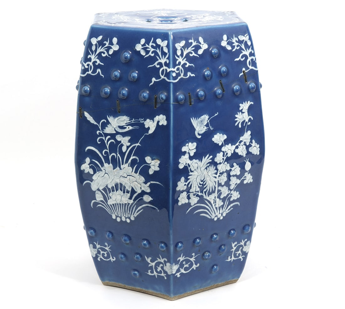 Chinese Porcelain Garden Seat AS-IS: Chinese porcelain garden seat, features blue and white floral pattern. Measures 19"H x 13"W. Condition report: AS-IS condition, visible old repair, please examine all photos closely. Contact C. Biddle