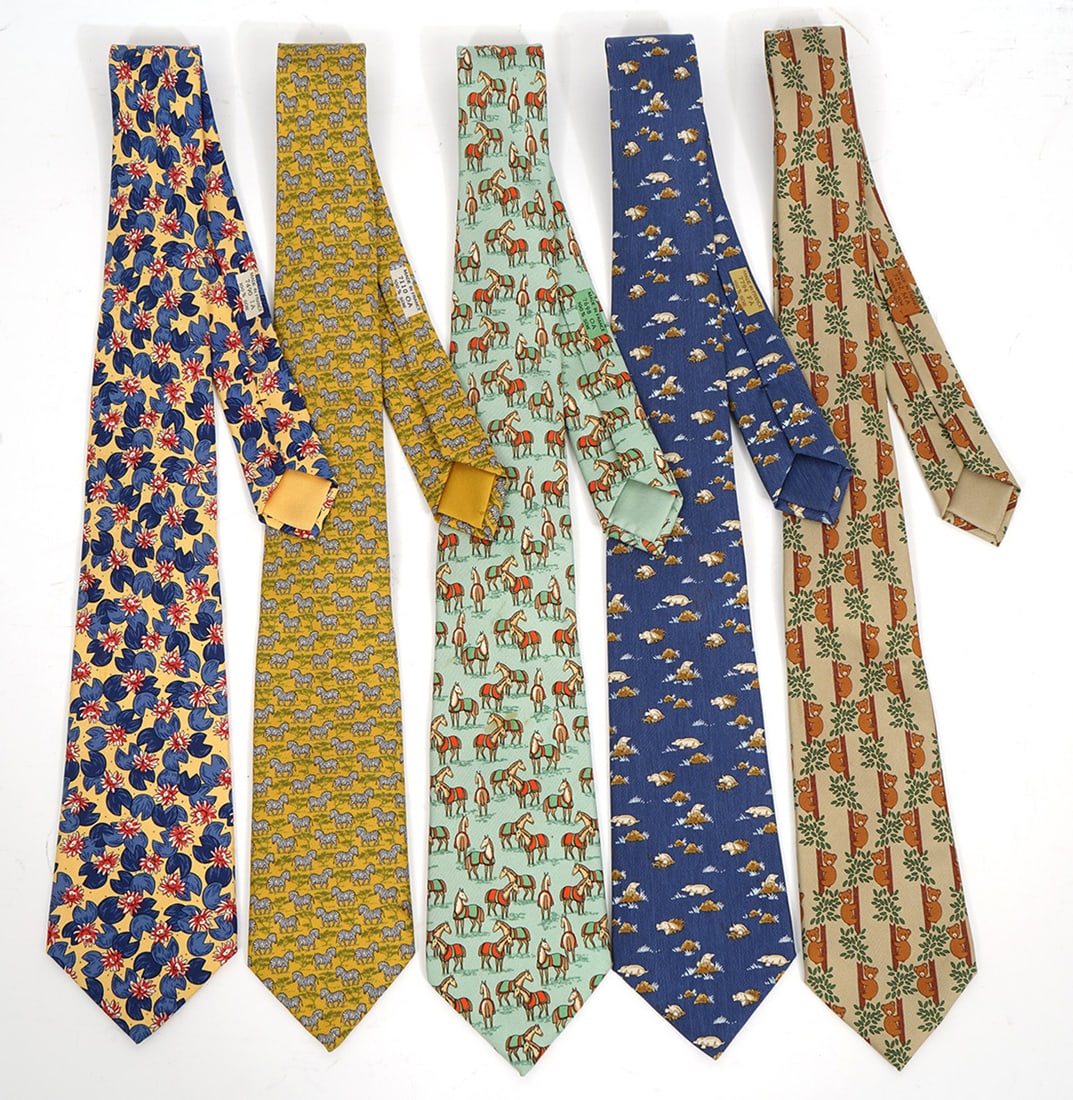 5 Hermes Paris Vintage Ties: 5 Hermes Paris Vintage Ties includes Ground Hogs, Bears, Horse, Zebras, & Water Lillies. Condition report: Good, please see all photos. Contact C. Biddle Auction Gallery for more detailed information.