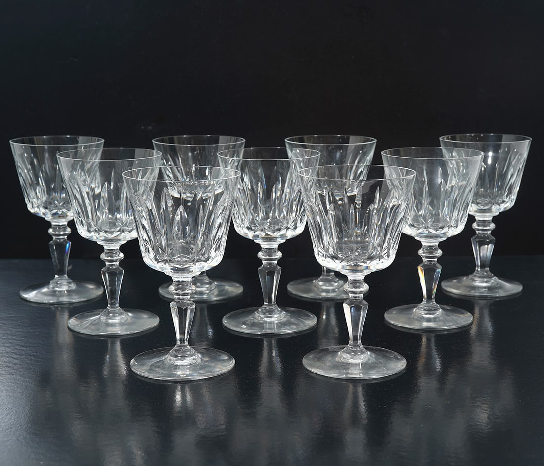 9 Baccarat "Ile-de-France" Port Wine Glasses: 9 Baccarat "Ile-de-France" port wine glasses, each measures 5.5"H. Acid etched marked underside. Condition report: One glass has chip to rim, please see all photos. Contact C. Biddle Auction Gallery f