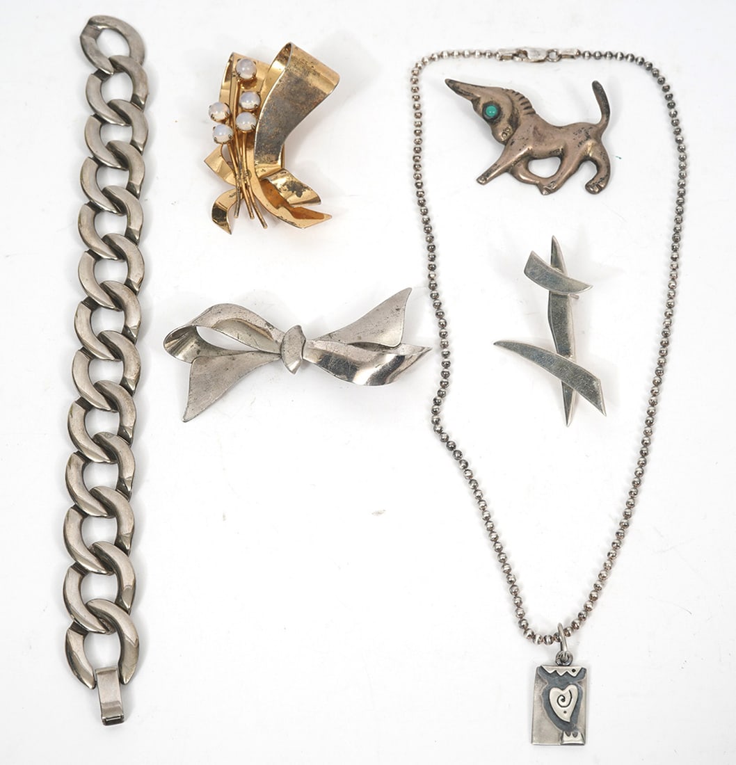 6Pc Sterling Silver Jewelry Group: Sterling silver flat link bracelet (7.5"), Annie Kayita sterling heart pendant pendant necklace (15"), sterling bow pin (2.5"), Coro sterling Retro style pin (2"), Mexican silver donkey pin with stone