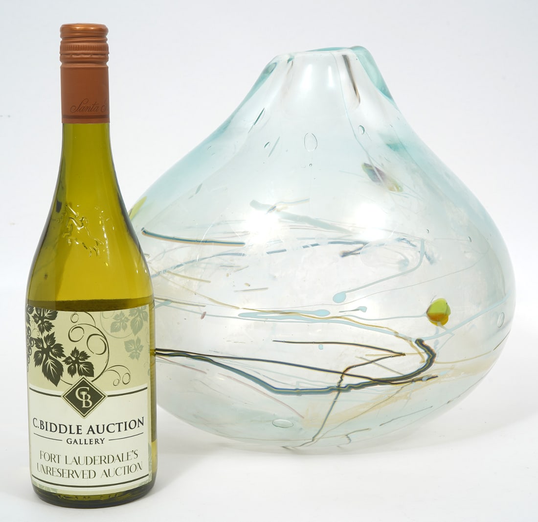 Angelo Rinaldi Signed Art Glass Teardrop Vase: Artisnal hand-blown art glass teardrop-shaped vase signed by Angelo Rinaldi underside and dated 1992. Measures 11"H x 11.5"W. Condition report: Good condition, please see all photos. Contact C. Biddle